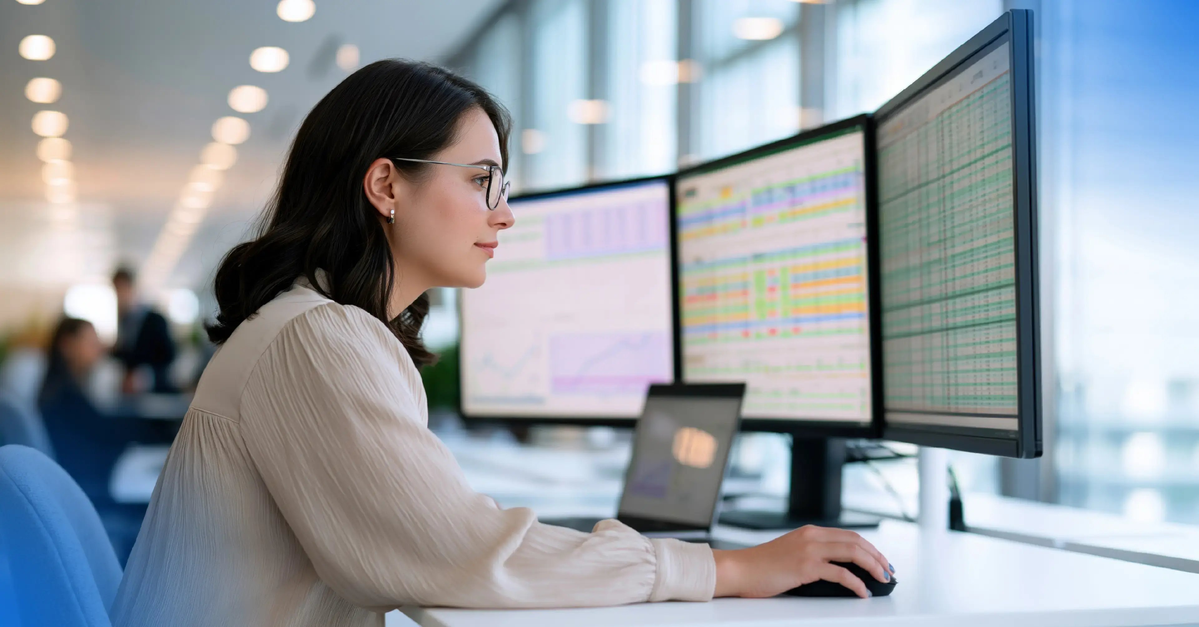 Woman in professional setting working at computer