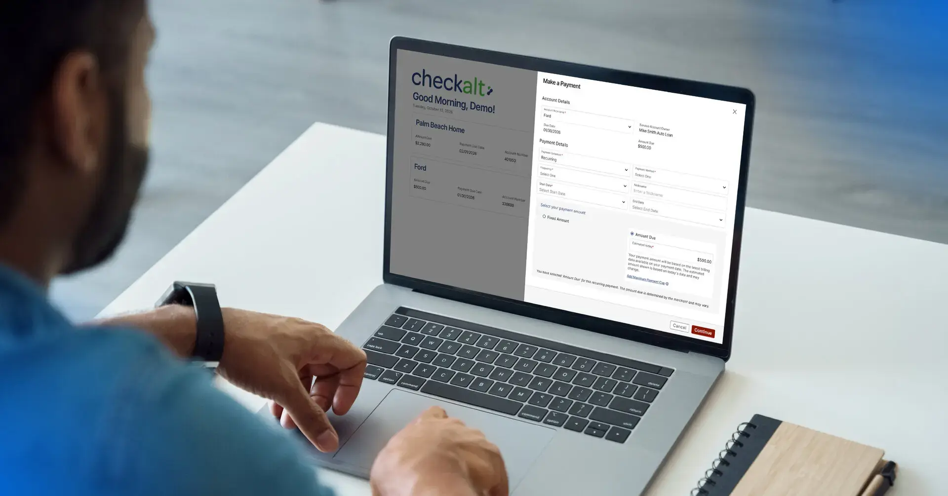 Person using a laptop showing the CheckAlt online payment portal, with a 
